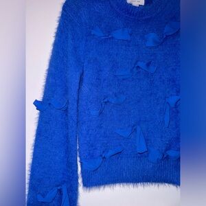 Selling this beautiful light fur sweater in a gorgeous royal blue color.